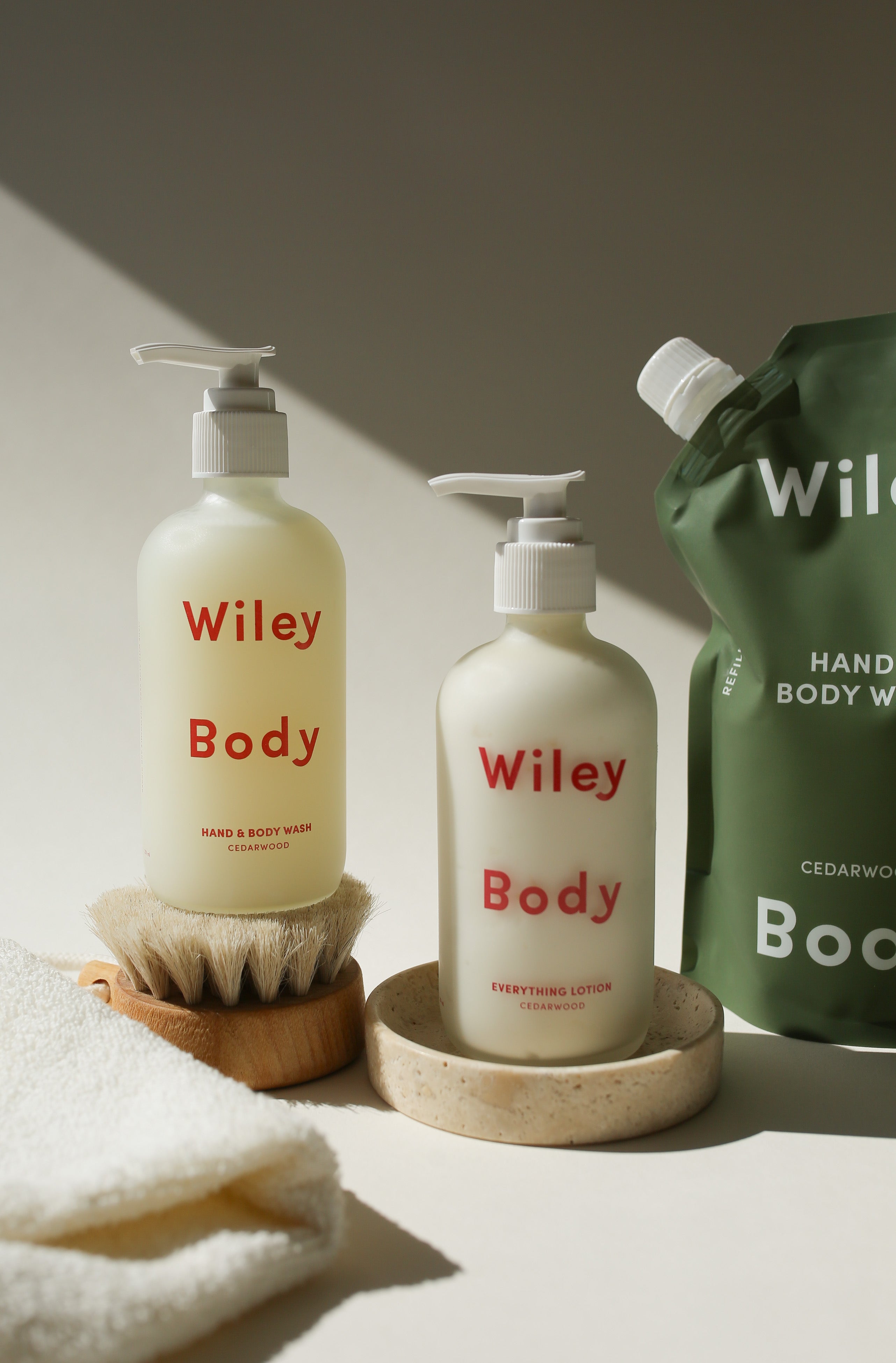 Wiley Body cedarwood hand and body wash and everything lotion set with refill pouch clean plant based bath essentials
