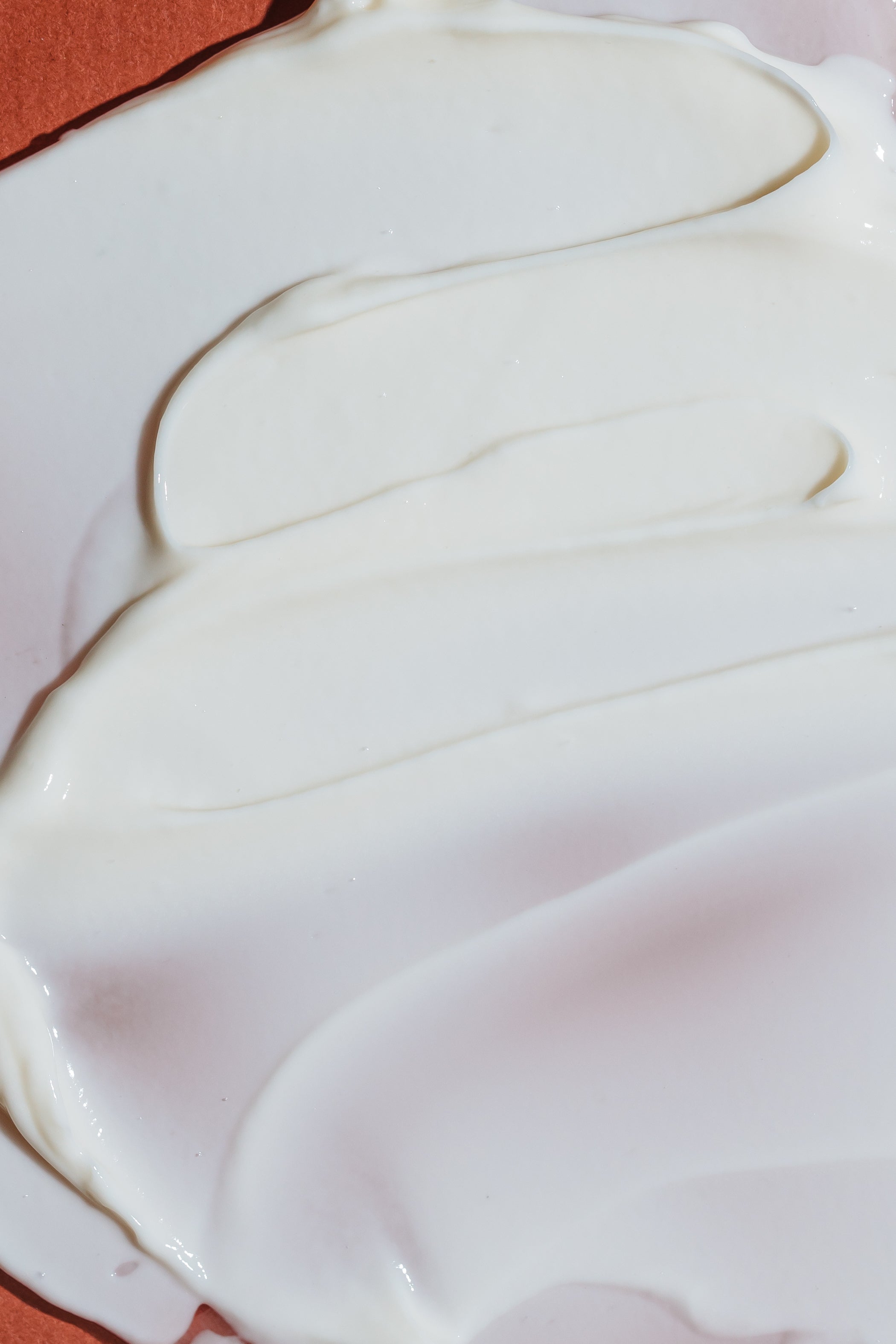 A texture photo showing the creaminess of the lotion